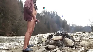 springbreaker nudist with cock ring at a sign